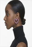 Una clip earrings