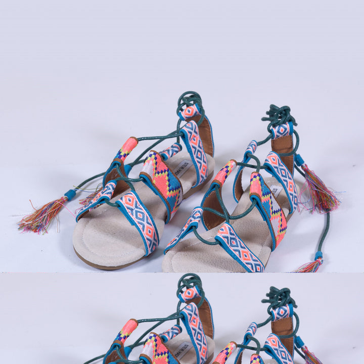 Shoe decorated with a tribal pattern