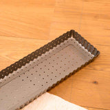 Rectangular perforated baking tray