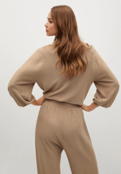 بلوزة بأكمام منتفخة