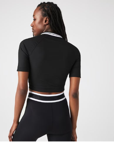 قميص بولو نسائي قصير مضلع ومطاطي من مجموعة Lacoste SPORT