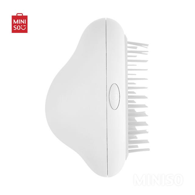 Vibrating massage brush