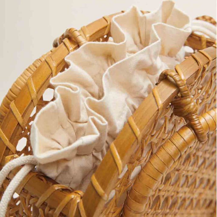 حقيبة دائرية من الخيزران