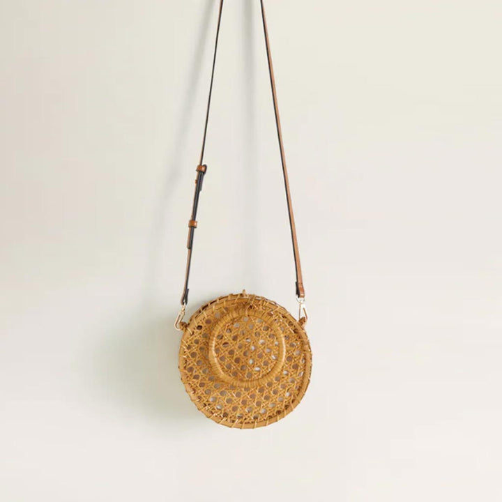 حقيبة دائرية من الخيزران