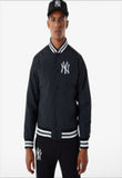 Black bomber jacket with the New York Yankees logo