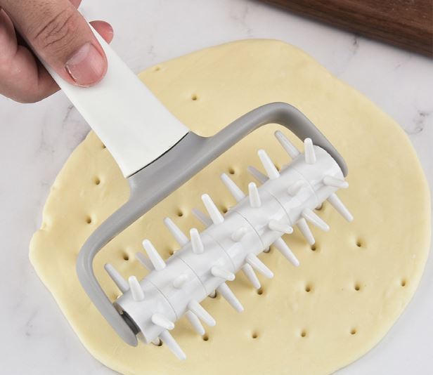 دبوس لف العجين