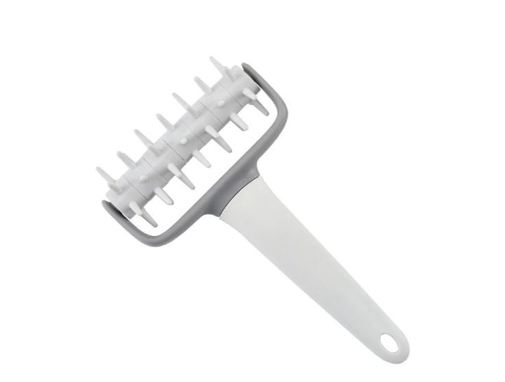 دبوس لف العجين