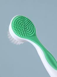 Double-sided facial cleansing brush